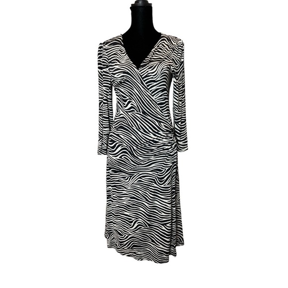 Express Dresses & Skirts - The perfect Zebra wrap dress Size M